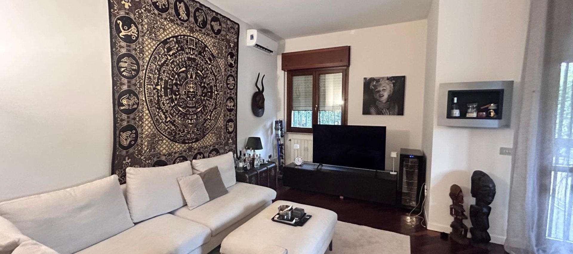 Elegante 3 locali con ampio giardino privato e taverna